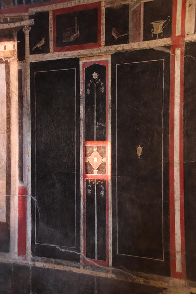 I.9.5 Pompeii. October 2024.
Room 10, east wall on south side of central wall painting. Photo courtesy of Klaus Heese