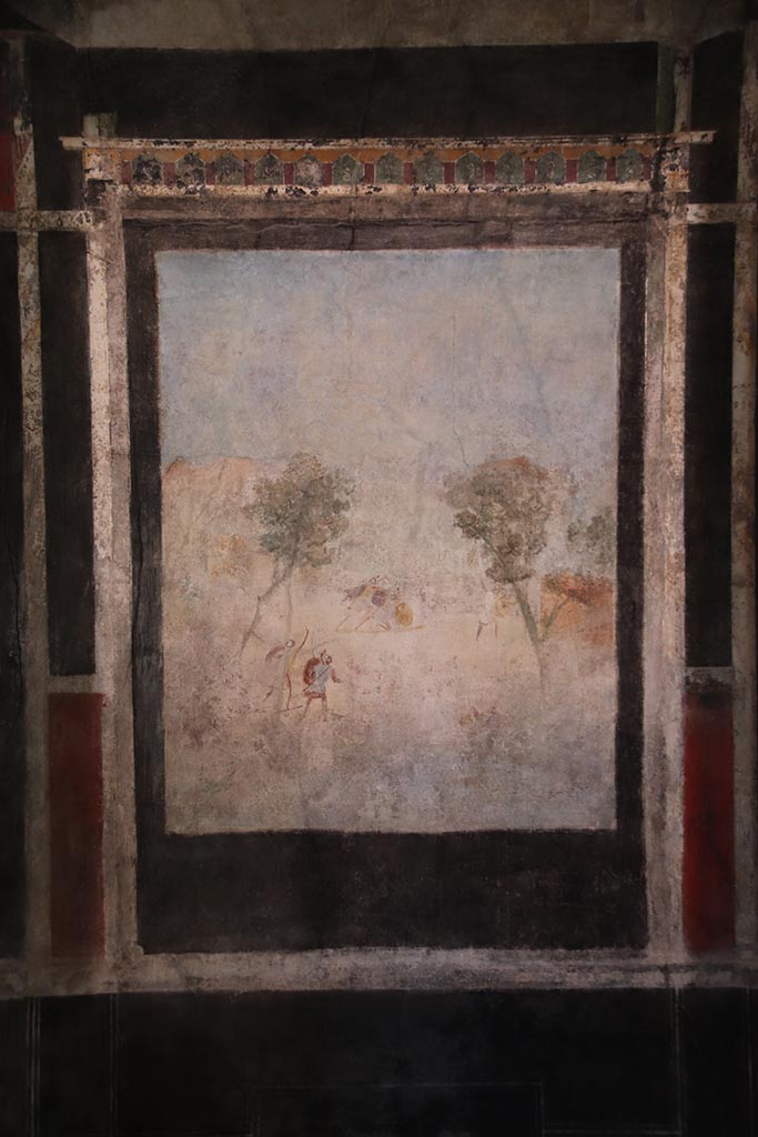 I.9.5 Pompeii. October 2024.
Room 10, central painting from north wall of triclinium, painting of the War under Troy or Seven against Thebes.
Photo courtesy of Klaus Heese