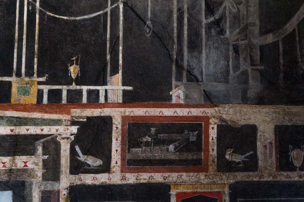 I.9.5 Pompeii. April 2022.
Room 10, detail from upper west wall of triclinium on north side of central painting. Photo courtesy of Johannes Eber.