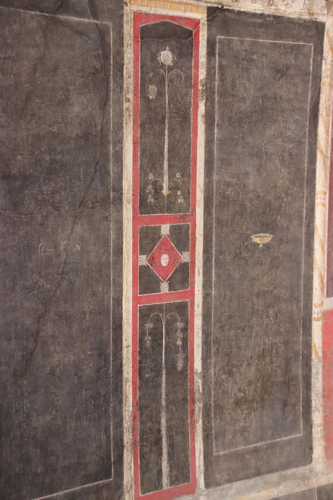 I.9.5 Pompeii. October 2024.
Room 10, panel on south side of central painting on west wall. Photo courtesy of Klaus Heese