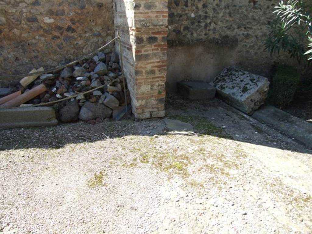 I.9.5 Pompeii. March 2009. Room 17, triclinium. Looking towards west wall in north-west corner, and south portico.