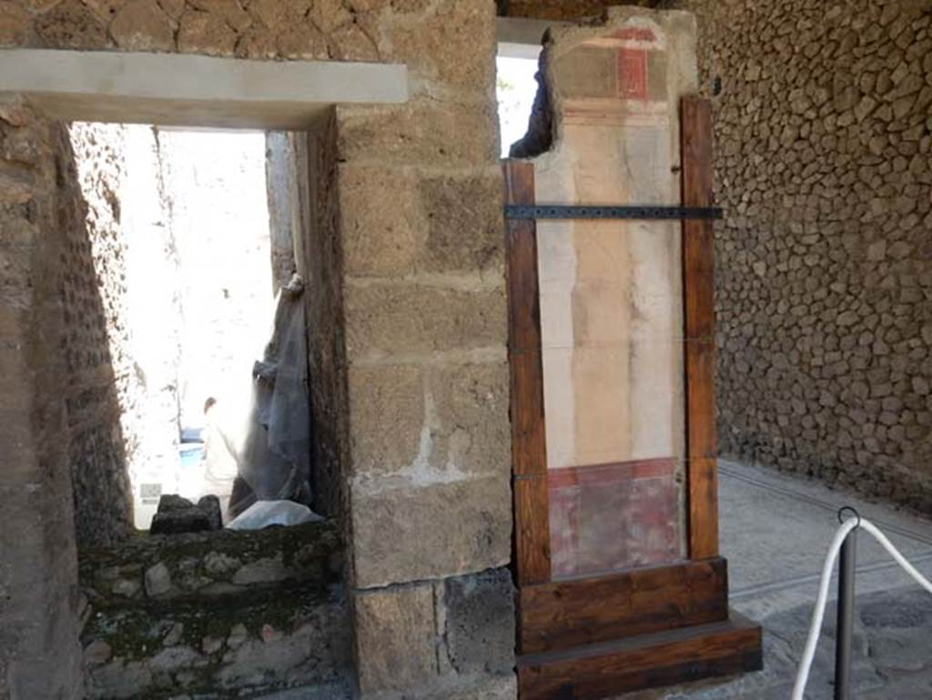 I.9.5 Pompeii. May 2016. Room 12, north-west corner of north portico, looking through to room 9, stairs to upper floor, on left. On the right is the tablinum. Photo courtesy of Buzz Ferebee.