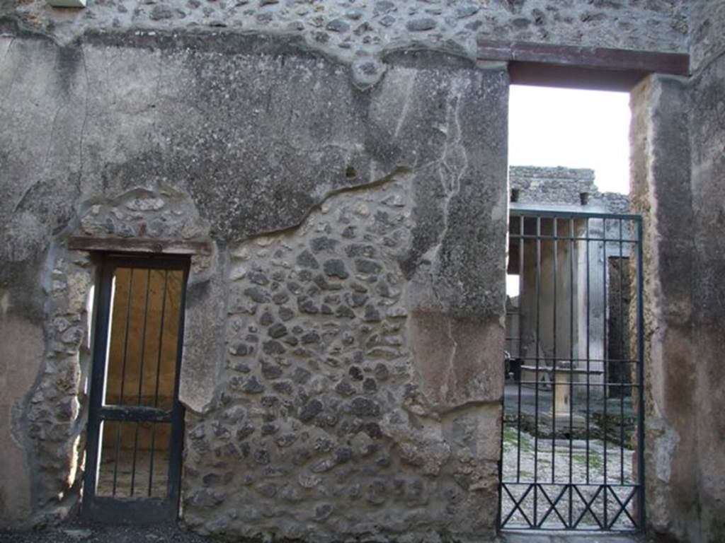 I.9.6 Pompeii. December 2007. South wall. Doorway on the left is to cubiculum of I.9.5. Doorway on the right is to the atrium of I.9.5.