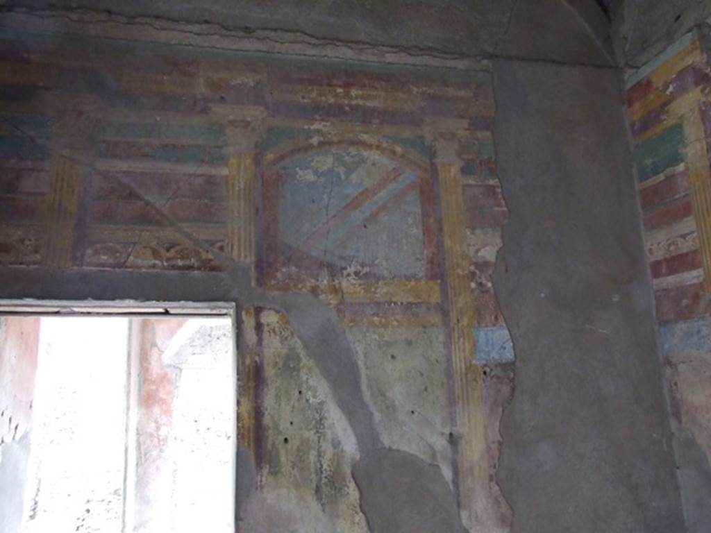 I.9.14 Pompeii. March 2009. Room 7, architectural painting from upper part of east wall.