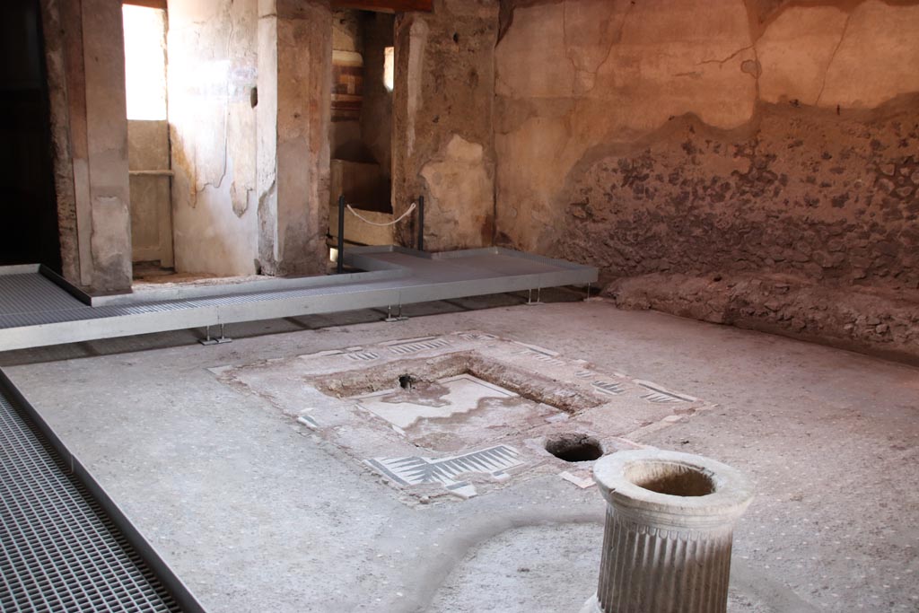 I.9.14 Pompeii. October 2022. Room 8, looking south-west across impluvium in atrium. Photo courtesy of Klaus Heese.