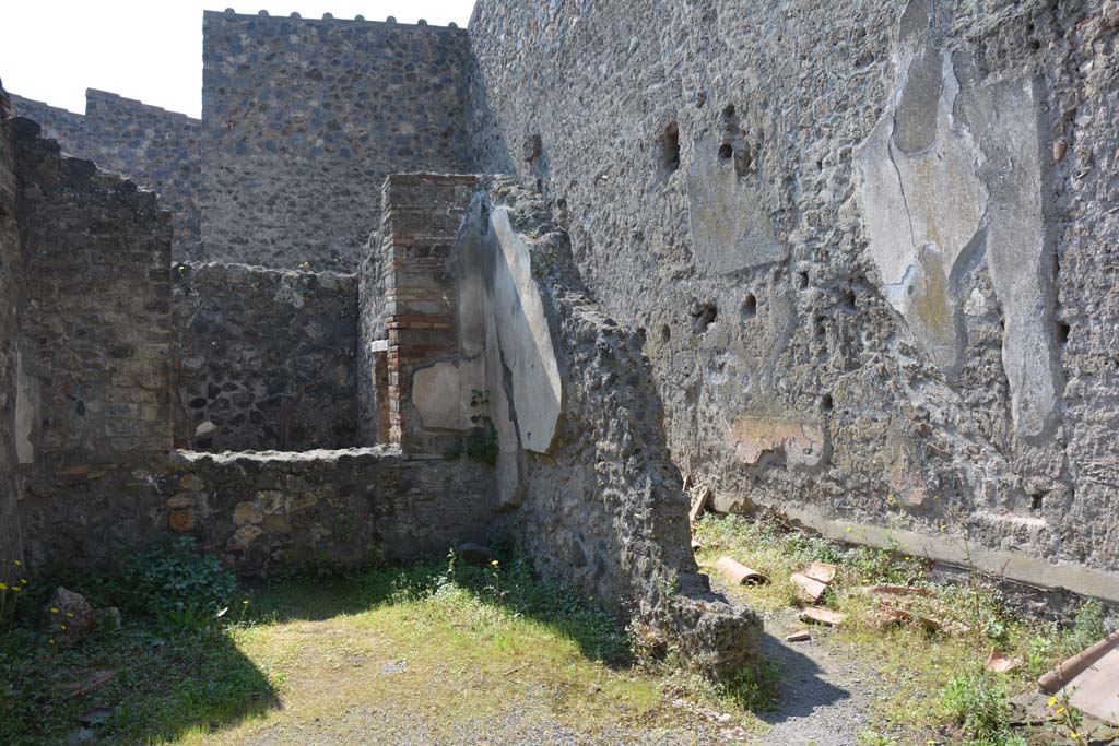 I.10.3 Pompeii. April 2017. Looking across atrium towards west side of tablinum, and room 9 on plan, on right.
Photo courtesy Adrian Hielscher.
According to NdS,
“Room 9 was a corridor with steps to the upper floor, which probably had only two or three rooms overlooking the front of the roadway, and perhaps one built above the pseudo-atrium. The fall of the upper walls and the state of conservation of the few left standing, with traces of 4th Style decoration, do not give a clear interpretation of the distribution of rooms.”
See Notizie degli Scavi di Antichità, 1934, 274-5.