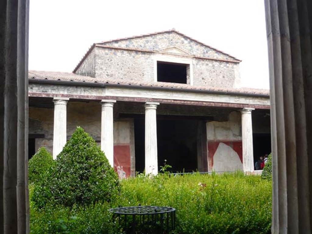 I.10.4 Pompeii. May 2012. Looking east across peristyle to entrance to room 18, centre. Photo courtesy of Buzz Ferebee.