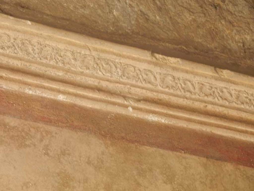 I.10.4 Pompeii. May 2017. Detail of stucco on north wall of corridor 16. Photo courtsy of Buzz Ferebee.