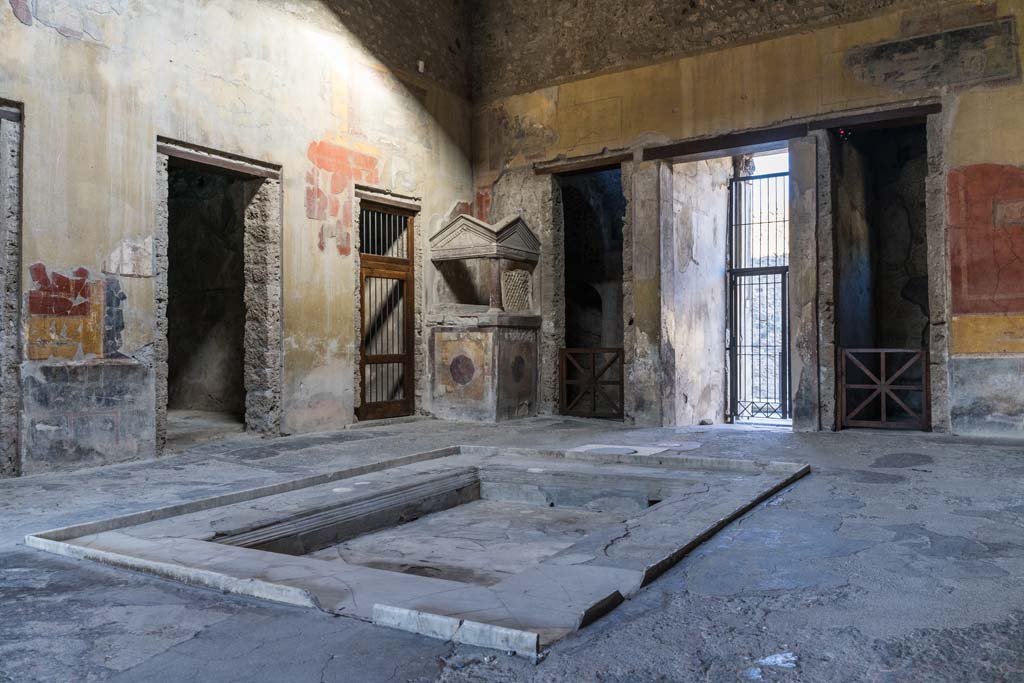 I.10.4 Pompeii. April 2022. Looking north-west across impluvium in atrium. Photo courtesy of Johannes Eber.