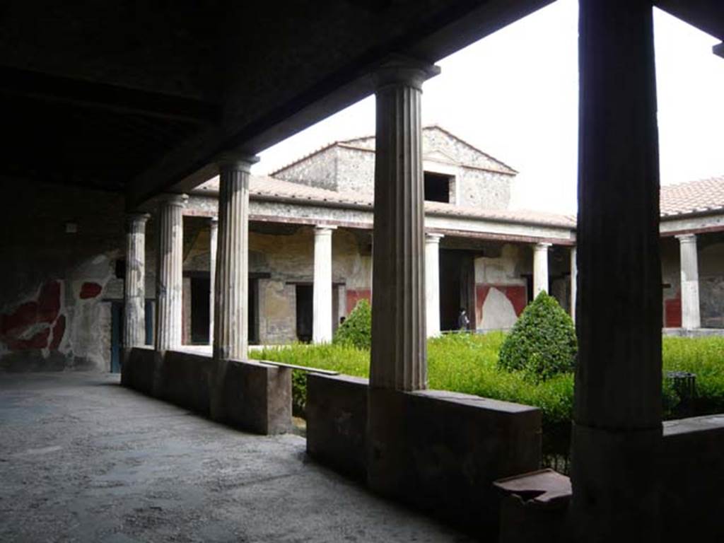 I.10.4 Pompeii. May 2012. Looking across north portico towards east side. Photo courtesy of Buzz Ferebee.