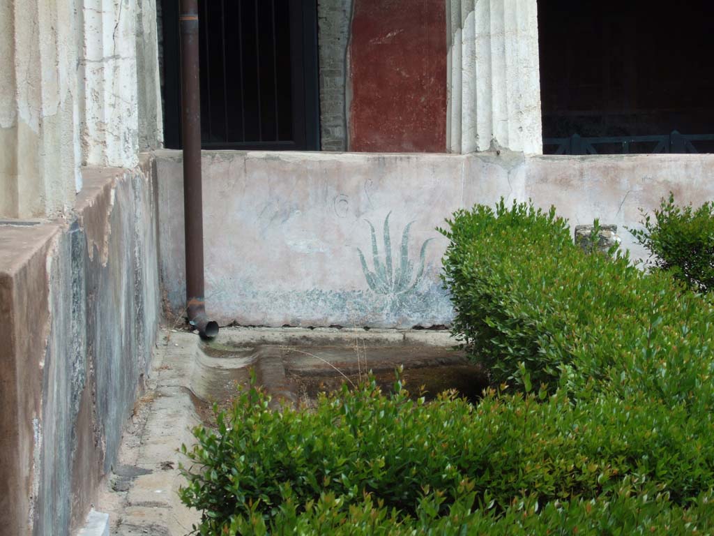I.10.4 Pompeii. May 2006. Peristyle garden, detail of painted pluteus in north-east corner.