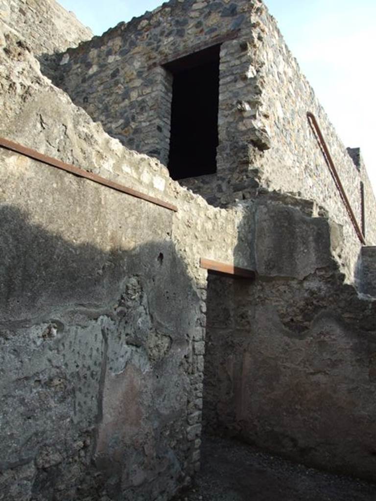 I.10.6 Pompeii. December 2007. Doorway in east wall of workshop and doorway on floor above.