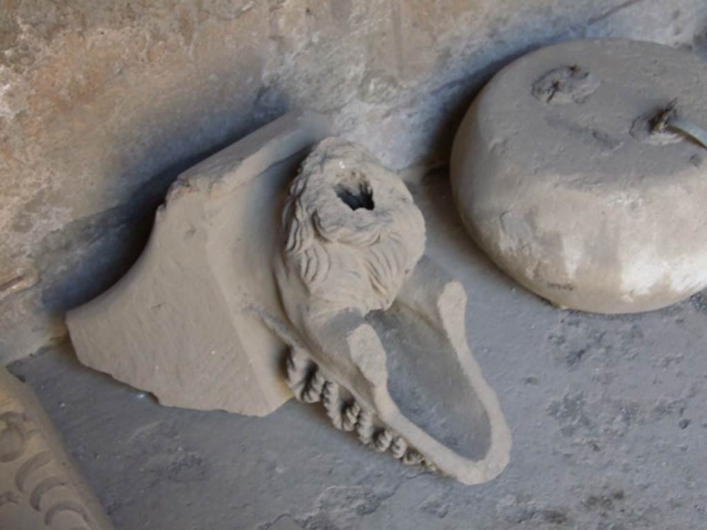 I.10.7 Pompeii. March 2009.   Room 3.  Cubiculum.  Grondaia or antefisse fittili  (rainwater spouts for gutters).
