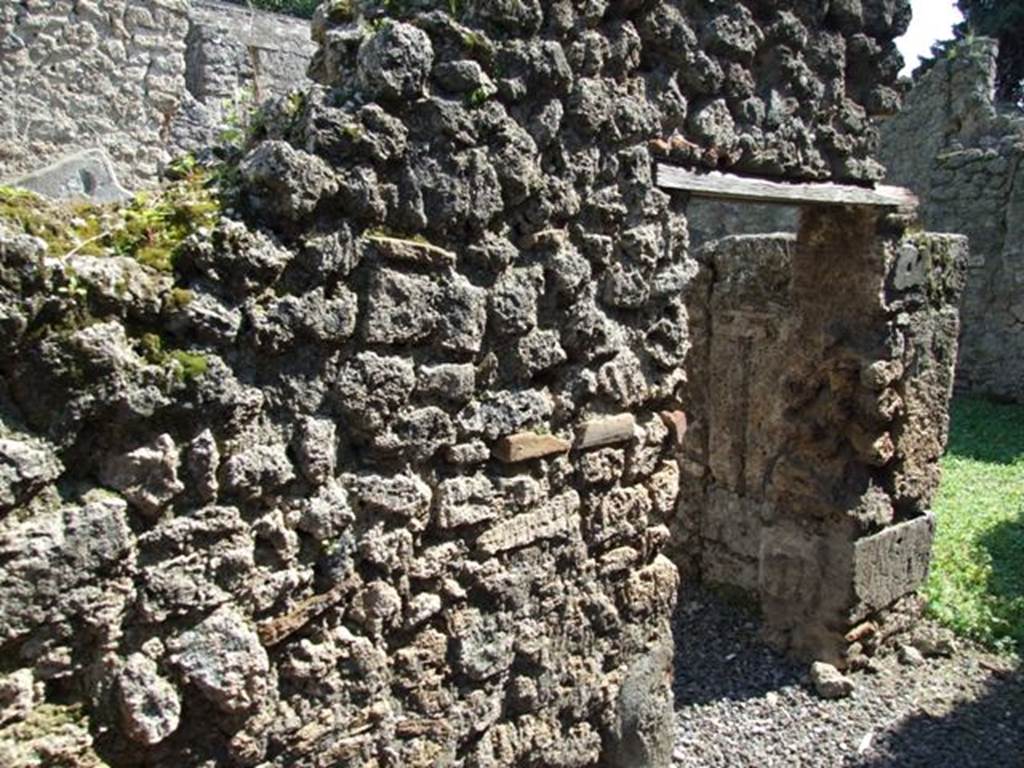 I.10.8 Pompeii. March 2009. Door to room 10 in East wall of kitchen.