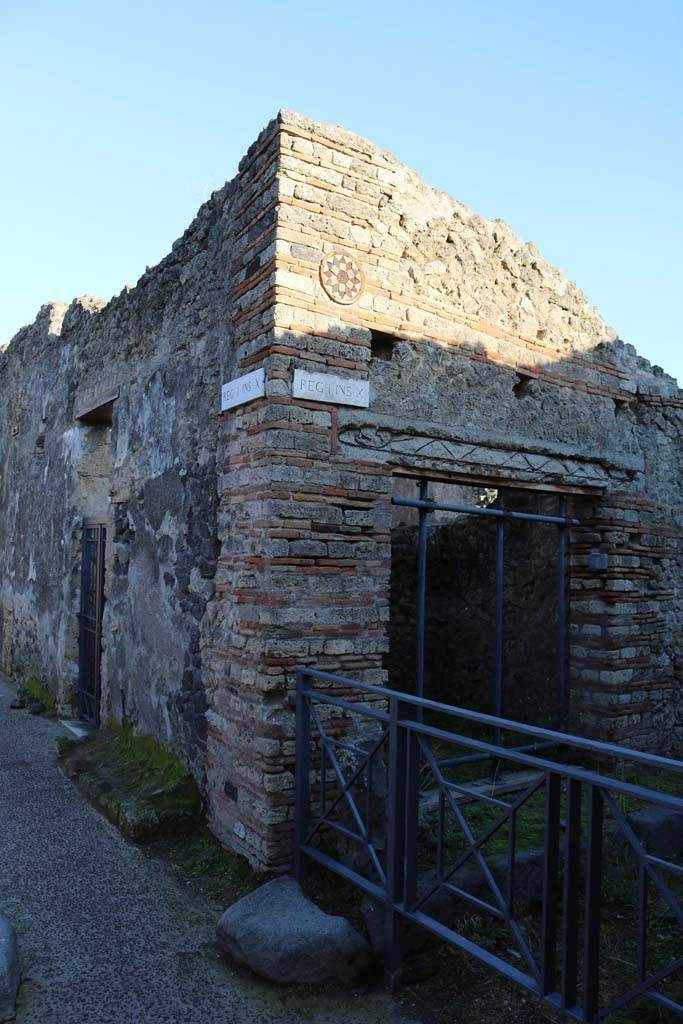 I.10.8, on left, and I.10.9, on right, Pompeii. December 2018.
Looking towards east corner at junction with Vicolo del Menandro. Photo courtesy of Aude Durand.