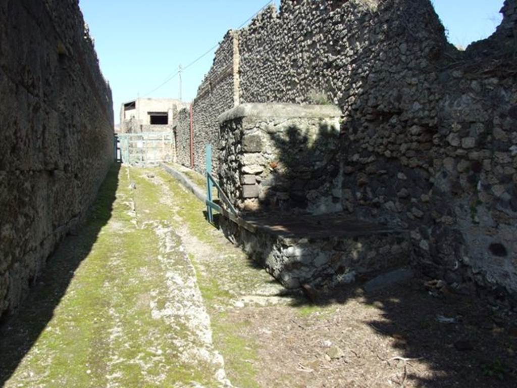 I.10.9 Pompeii. March 2009. Structure on west wall of insula to the south of I.10.9. Looking north along the Vicolo del Citarista.