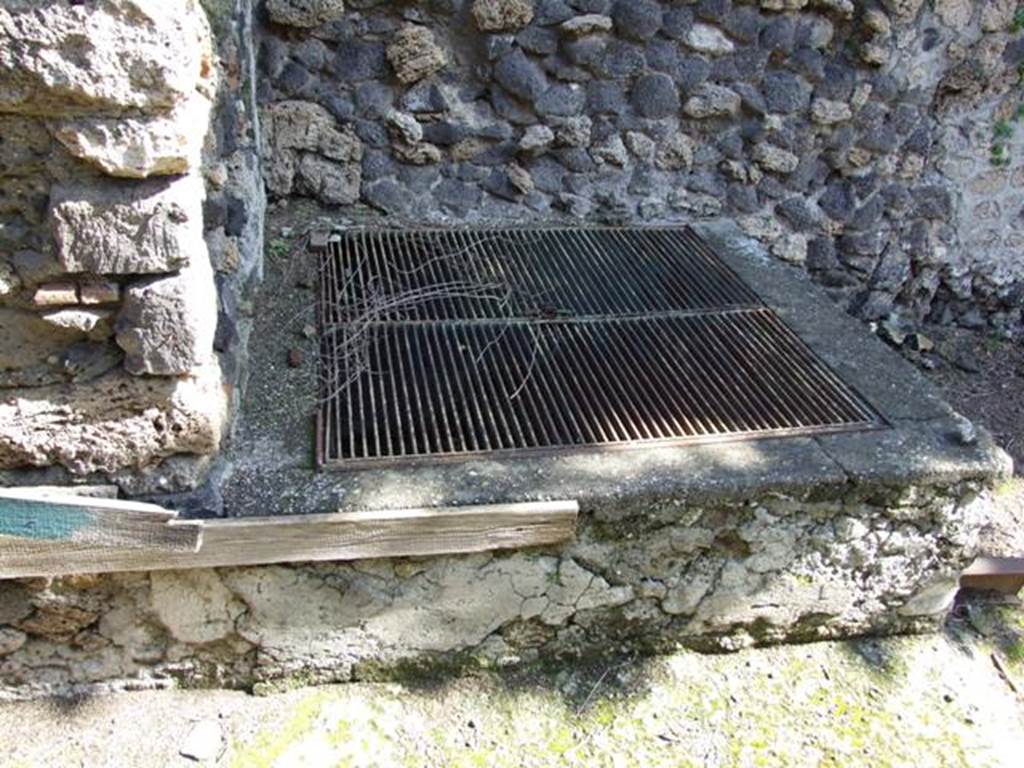 I.10.9 Pompeii. March 2009. Structure on west wall of insula to the south of I.10.9. The grating of the Sarno Canal of Domenico Fontana is south of the structure.