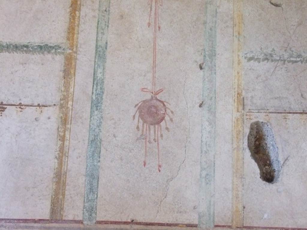 I.10.11 Pompeii. March 2009. Room 7. Cubiculum. West wall. Painting of suspended tambourine. See Bragantini, de Vos, Badoni, 1981. Pitture e Pavimenti di Pompei, Parte 1. Rome: ICCD. (p.143).