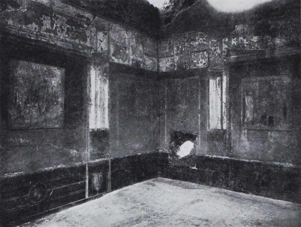 I.10.11 Pompeii. Room 8, looking towards painted decoration in south-west corner, and ancient hole in west wall of triclinium.
See Notizie degli Scavi di Antichità, 1934, (p.330, fig.34).