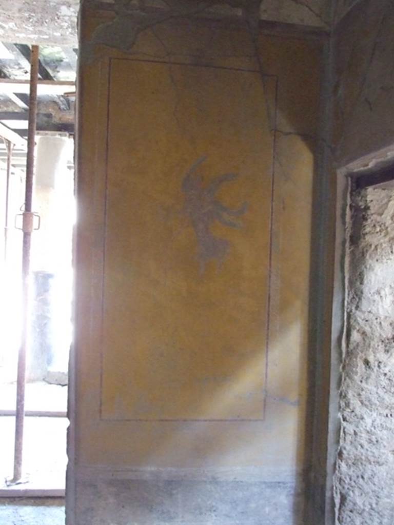 I.10.11 Pompeii. March 2009.
Room 8, painting of a flying figure from east wall in south-east corner of triclinium.