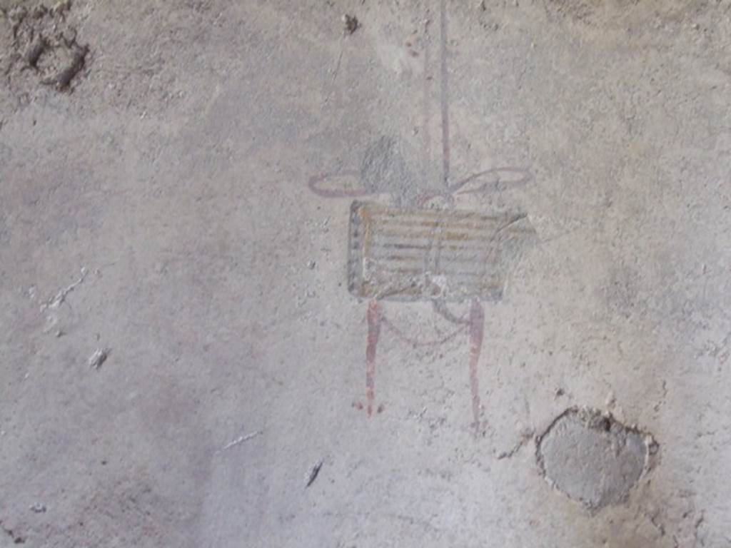 I.10.11 Pompeii. March 2009. Room 10, painting of hanging reed pipes from west end of north wall of peristyle. See Bragantini, de Vos, Badoni, 1981. Pitture e Pavimenti di Pompei, Parte 1. Rome: ICCD. (p.145).