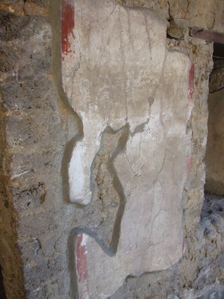 I.10.11 Pompeii. March 2009. Room 10, east wall of peristyle, between doorway and window of room 11. Site of graffiti?