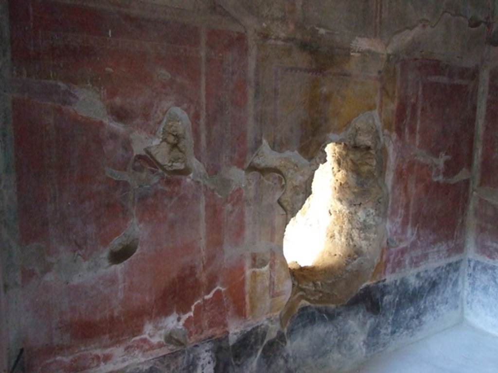 I.10.11 Pompeii. March 2009. Room 12. Cubiculum. North wall. Ancient hole in wall.
