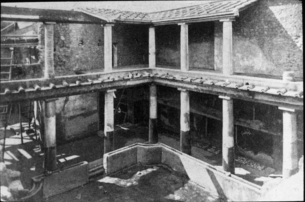 I.10.11 Pompeii. Looking north-west across peristyle garden towards upper and lower floors. Photo by permission of the Institute of Archaeology, University of Oxford. File name instarchbx202im 028. Source ID. 44515. See photo on University of Oxford HEIR database