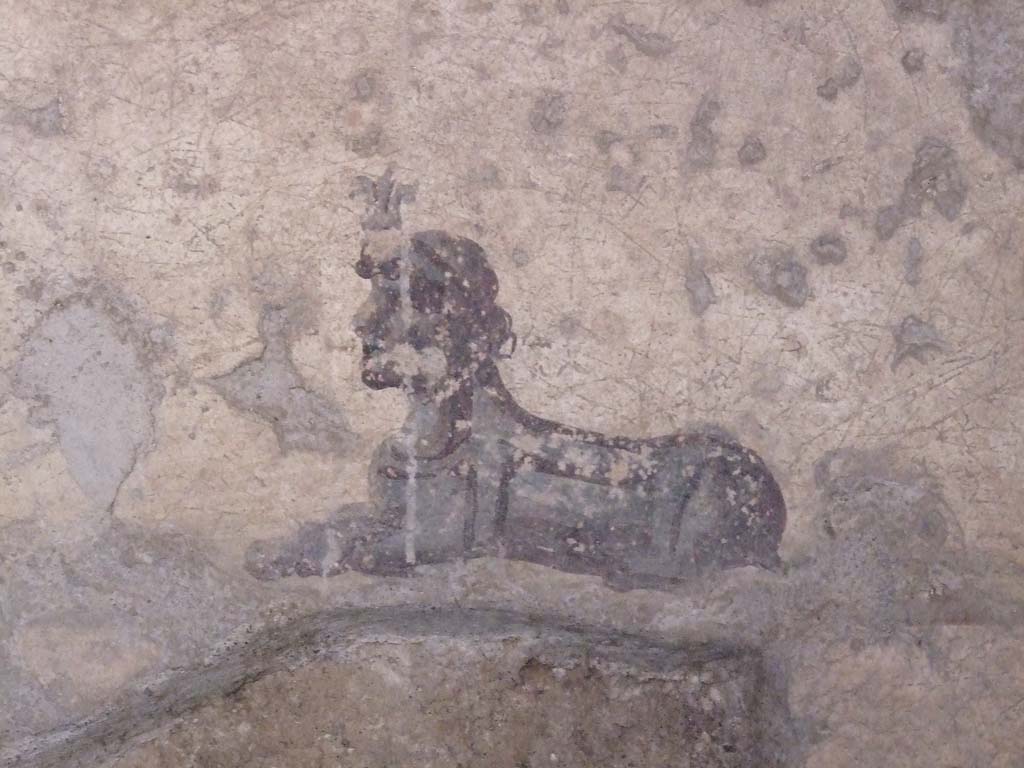 I.10.11 Pompeii. March 2009. Room 7, painting of sphinx from centre of panel at west end of south wall of cubiculum.
See Bragantini, de Vos, Badoni, 1981. Pitture e Pavimenti di Pompei, Parte 1. Rome: ICCD. (p.143).