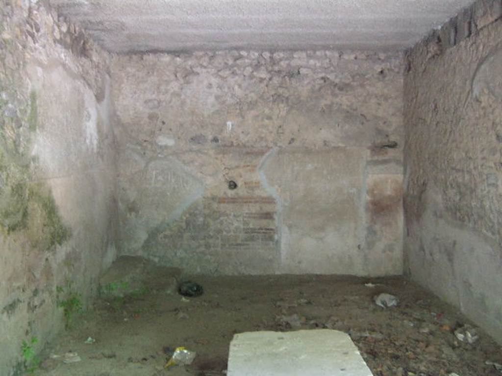 I.10.13 Pompeii. September 2005. Looking west across bar-room towards base of steps to upper floor, in south-west corner.