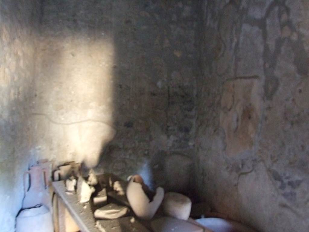 I.10.16 Pompeii. March 2009. L shaped Kitchen. Looking south.