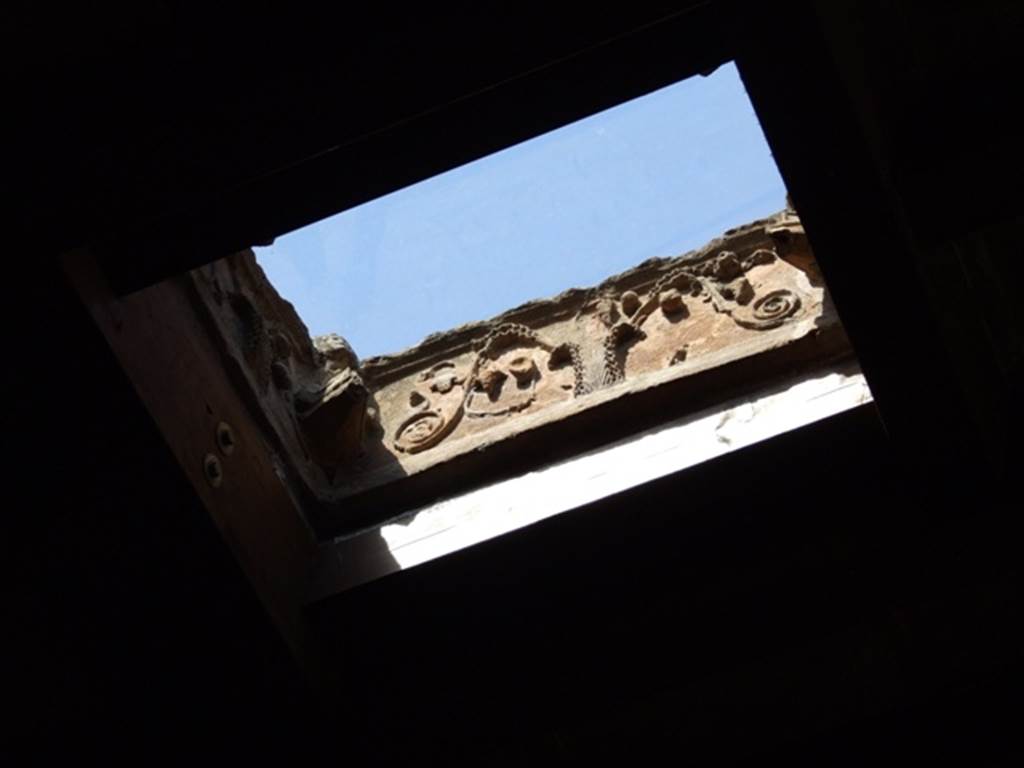 I.10.16 Pompeii. March 2009. Atrium. Terracotta Compluvium. Decorated relief on side which has satyr’s head missing.