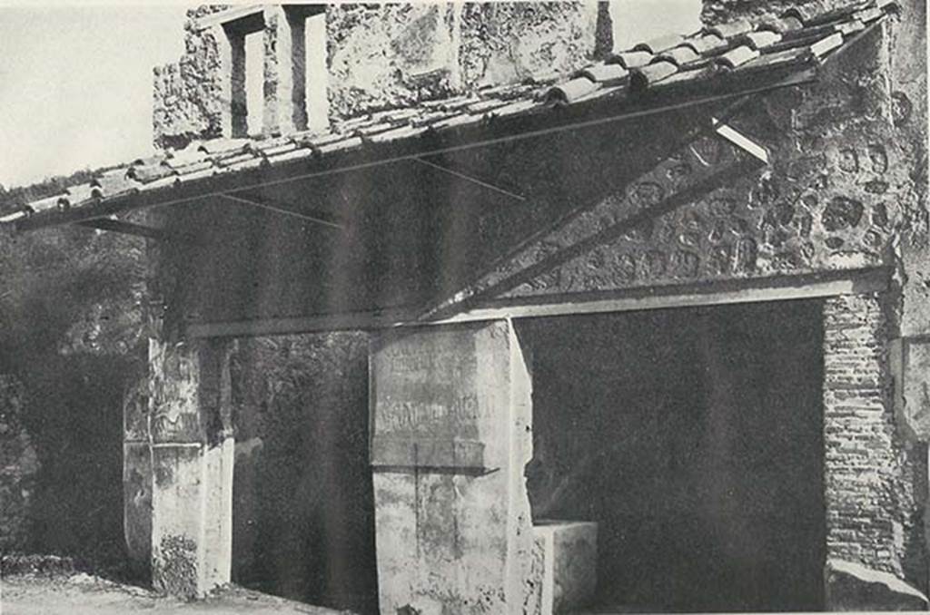I.11.3 Pompeii, on left, c.1920. Entrance doorways, with I.11.2 on right.
The painted electoral programmata are on the pillar to the left of the doorway.
