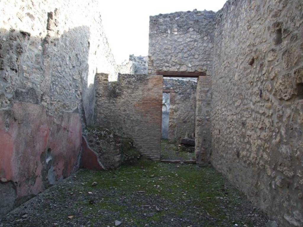 I.11.3 Pompeii. December 2007. South wall with door to rear.
