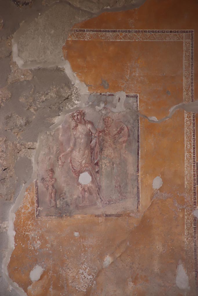 I.11.6 Pompeii. May 2024. Room 5, south wall of tablinum.
Wall painting of Dionysus/Bacchus with Silenus, tambourine and satyr. Photo courtesy of Klaus Heese.