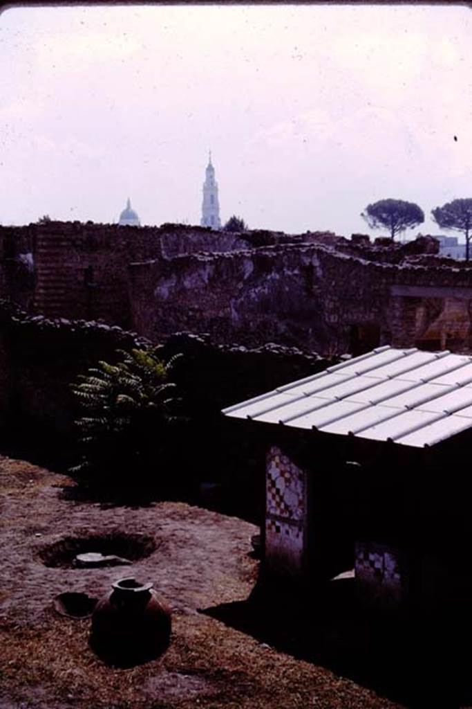 I.11.10 Pompeii. 1964. Looking south-east to small room against south wall. Photo by Stanley A. Jashemski.
Source: The Wilhelmina and Stanley A. Jashemski archive in the University of Maryland Library, Special Collections (See collection page) and made available under the Creative Commons Attribution-Non Commercial License v.4. See Licence and use details.
J64f1904