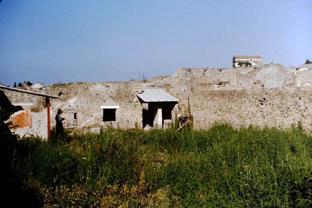 I.11.10 Pompeii. 1964. When the excavation was started, the area was covered with dense planting. It was decided, before clearing the entire area, to make a trial excavation and just to scrape down to the original ground layer. Wilhelmina watching and studying, on left, Sicignano working, on right. Photo by Stanley A. Jashemski.
Source: The Wilhelmina and Stanley A. Jashemski archive in the University of Maryland Library, Special Collections (See collection page) and made available under the Creative Commons Attribution-Non Commercial License v.4. See Licence and use details.
J64f1459