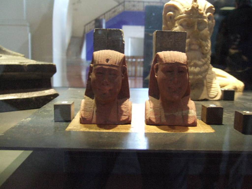 Two Egyptian style herm found in I.11.13. Now in Naples Archaeological Museum.