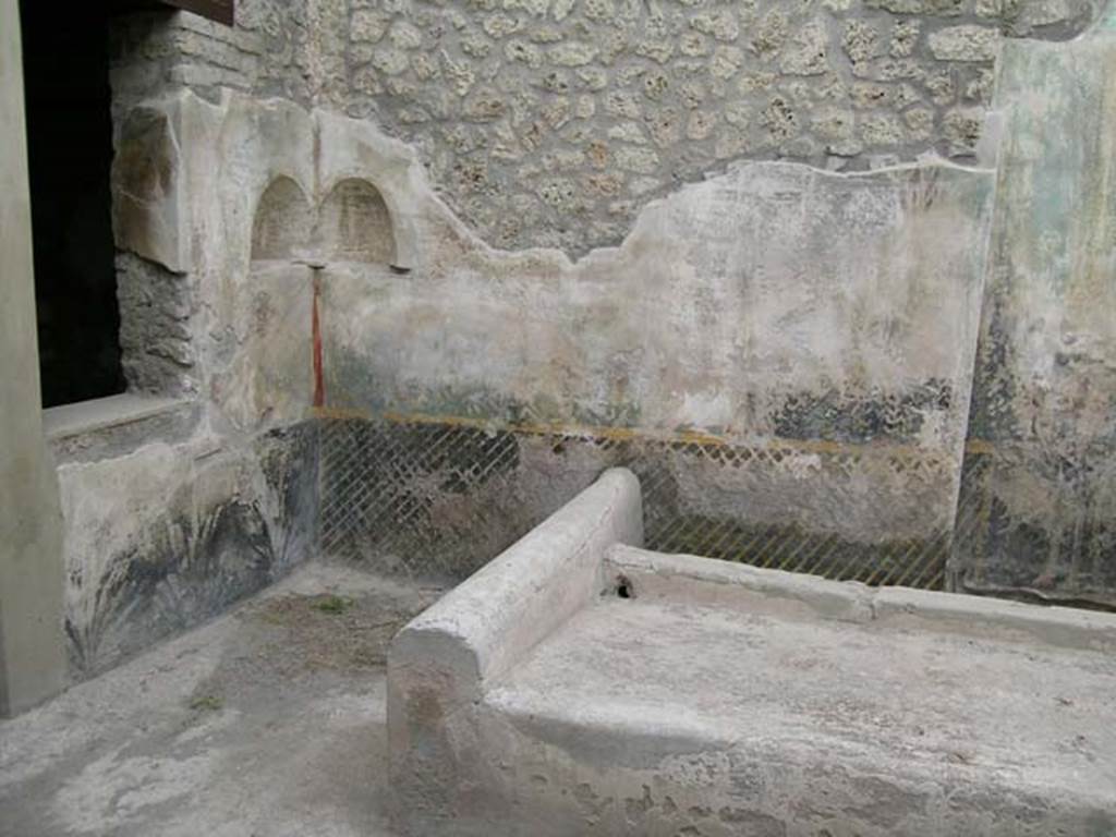 I.11.16 Pompeii. April 2004. Looking towards north-west corner and north wall.
Photo courtesy of Nicolas Monteix.