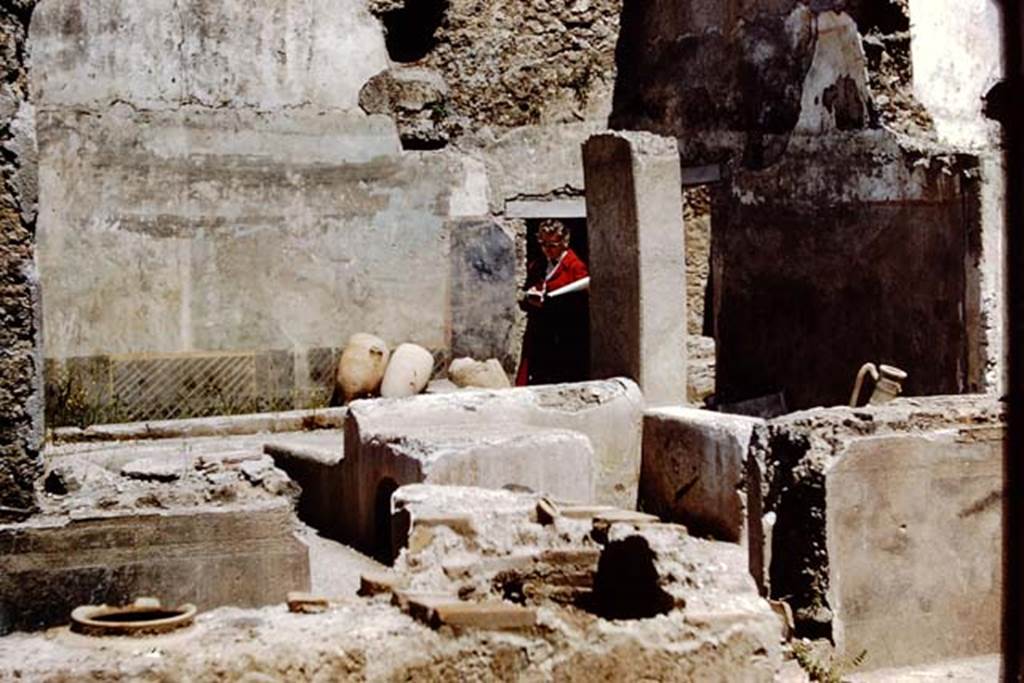 I.11.16 Pompeii. 1961. Looking south-east across courtyard towards site of roofed passageway. Photo by Stanley A. Jashemski.
Source: The Wilhelmina and Stanley A. Jashemski archive in the University of Maryland Library, Special Collections (See collection page) and made available under the Creative Commons Attribution-Non Commercial License v.4. See Licence and use details.
J61f0239