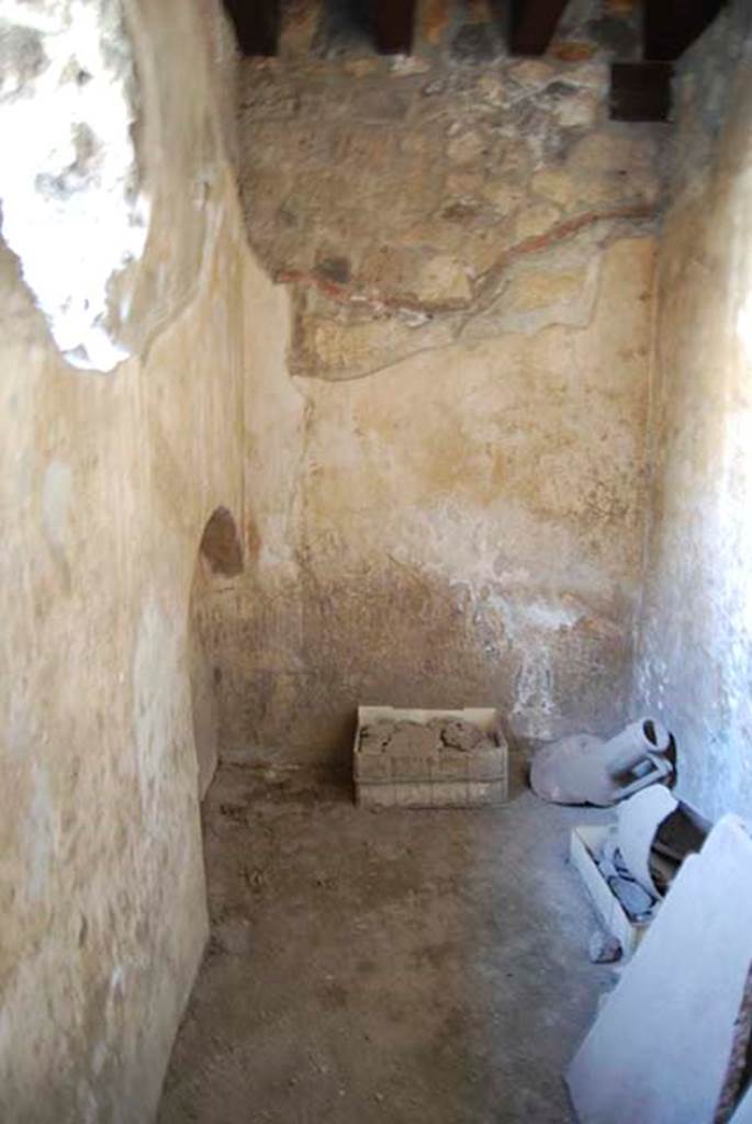 I.11.16 Pompeii. May 2103. Room 7A, looking south towards far end of room.
Photo courtesy of Paula Lock. According to Packer, the restored ceiling is 2.70m above the floor level, and there is a low arched bed niche in the south-east corner.