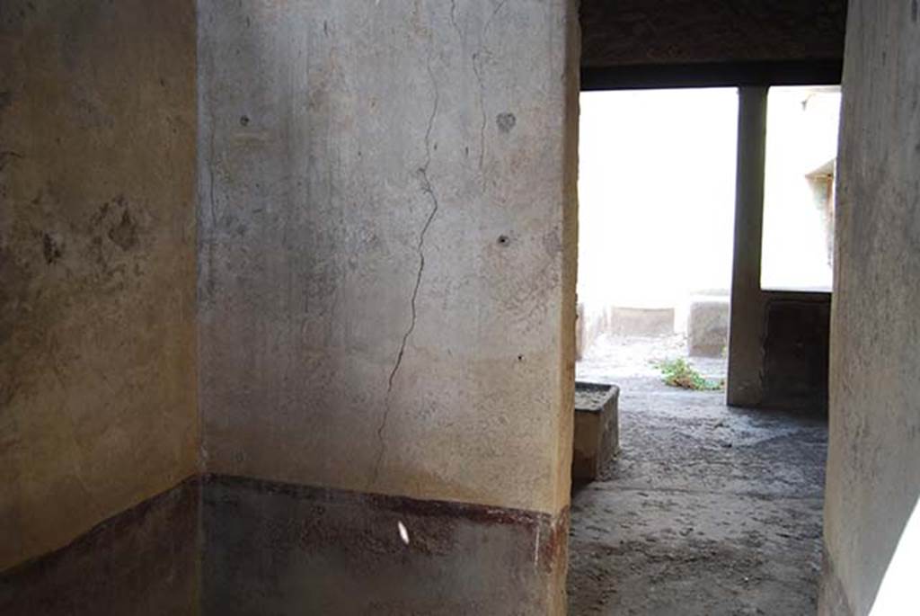 I.11.16 Pompeii. May 2103. Room 4, looking towards east wall with doorway to covered atrium. Photo courtesy of Paula Lock.