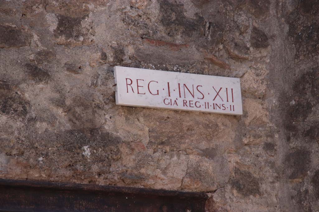 I.12.1 Pompeii. September 2019.
Insula identification plaque, Reg. I. Ins. X11, previously known as Reg. II, Ins. 11 (which is Reg. II, Ins. 2).
Photo courtesy of Klaus Heese.