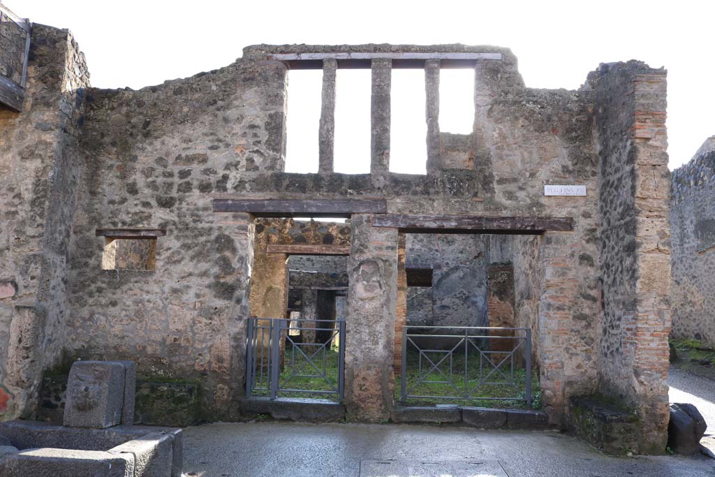 I.12.2 and I.12.1 Pompeii. December 2018. Looking south to entrances on Via dell’Abbondanza. Photo courtesy of Aude Durand.