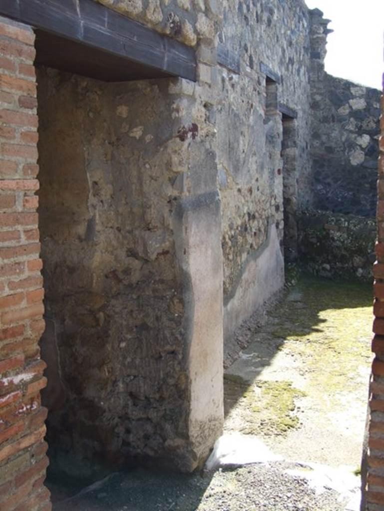 I.12.2 and I.12.1 Pompeii. March 2009. Doorway to room 13.