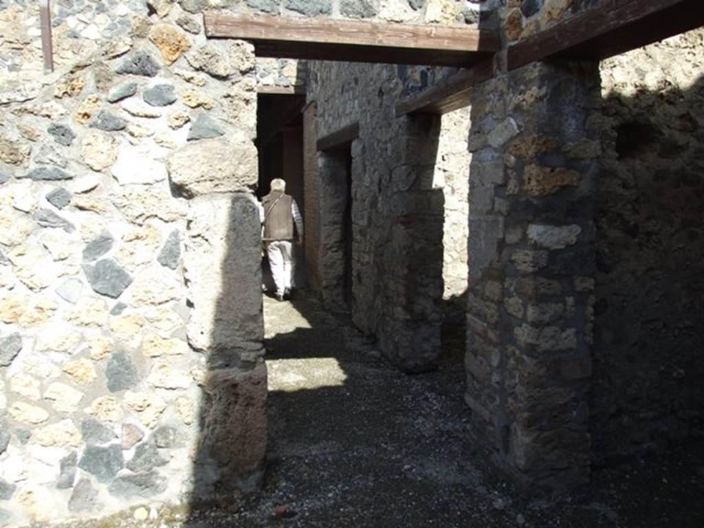 I.12.2 and I.12.1 Pompeii. March 2009. Corridor leading north from room 11, with doorways to rooms 18 and 19