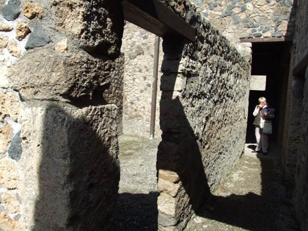 I.12.2 and I.12.1 Pompeii. March 2009. Corridor leading north from room 11, with doorway to room 17.