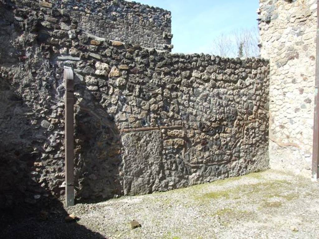 I.12.2 and I.12.1 Pompeii. March 2009. Room 17. West wall.