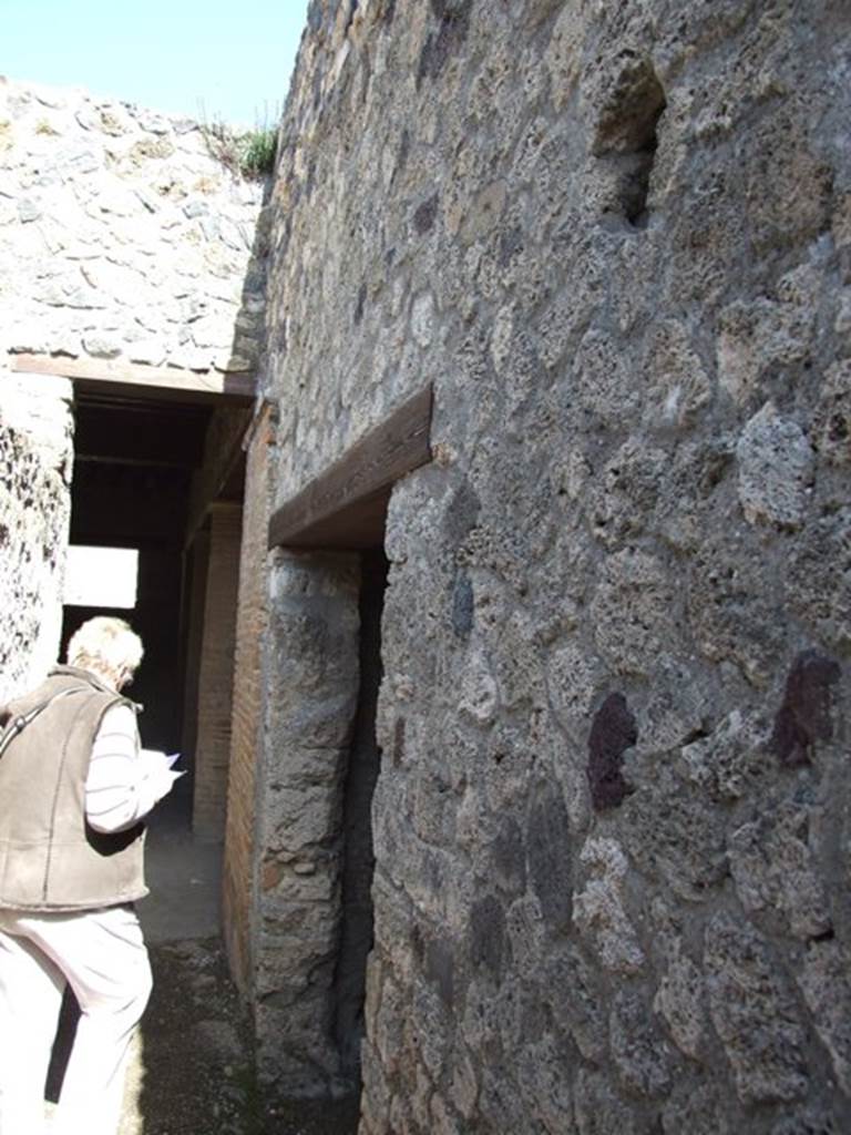 I.12.2 and I.12.1 Pompeii. March 2009. Doorways to Room 19 and Room 3. (ahead)