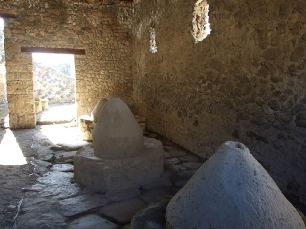 I.12.2 and I.12.1 Pompeii. March 2009. Room 3, room with mills. Looking south.